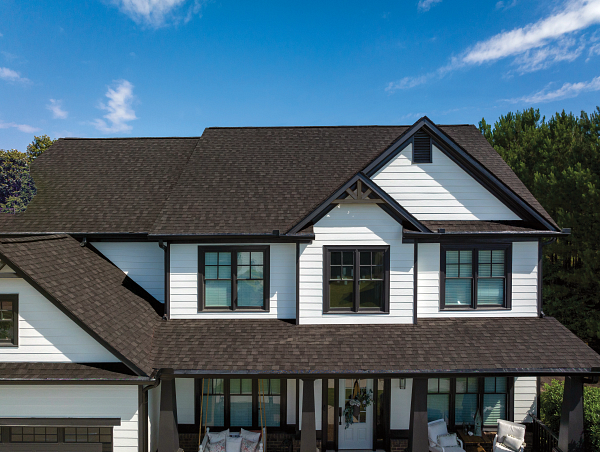 white house with dark roof